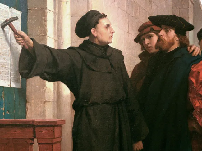 Martin Luther posting his 95 theses in 1517. Painting by Ferdinand Pauwels (1872).